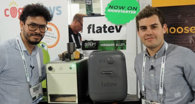 Carlos Ruiz, CEO and Jonas Müller, CTO, posing with Flatev appliance at Tech Crunch Disrupt.